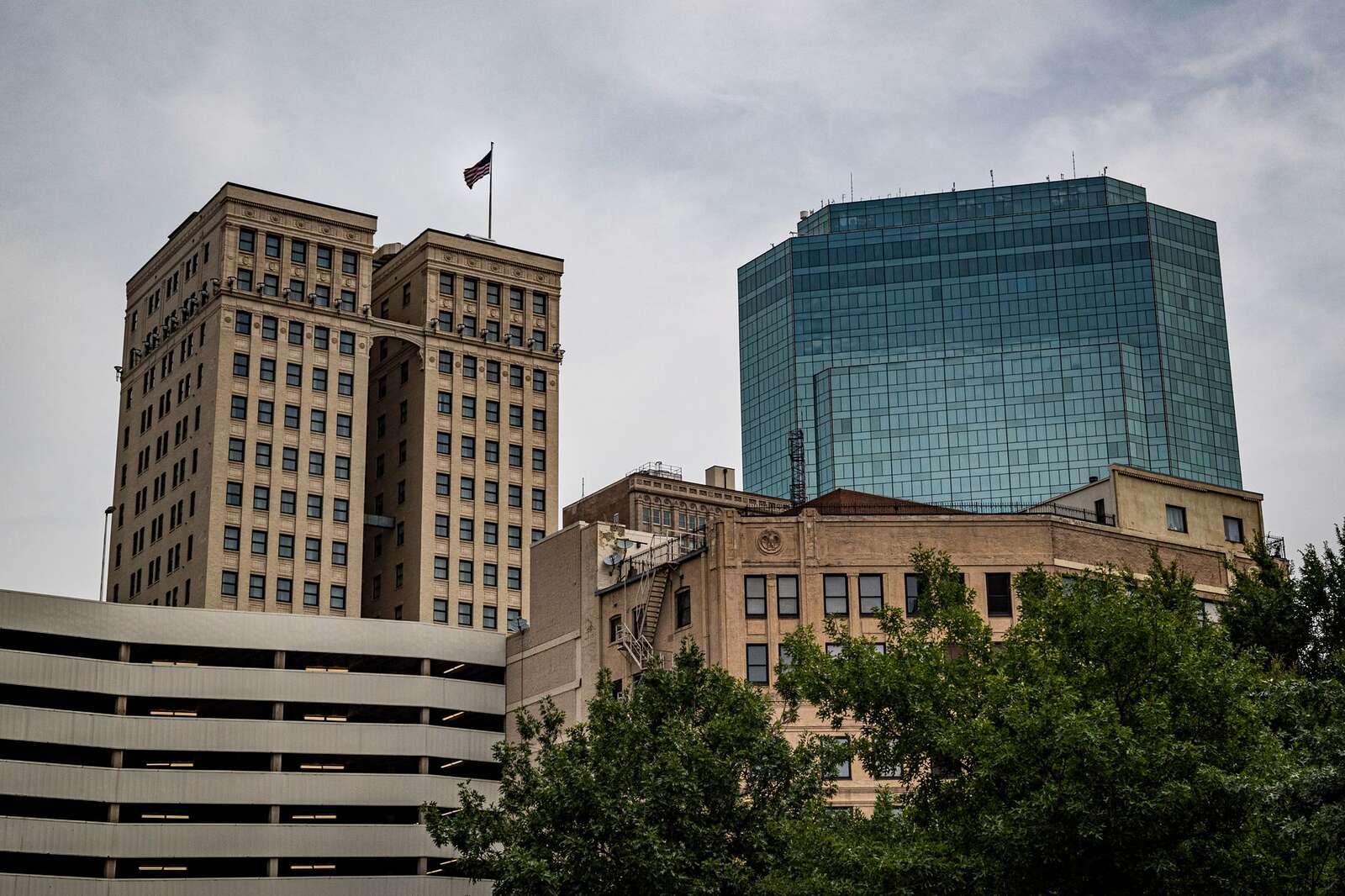 Downtown Fort Worth office towers of several eras seen from street level