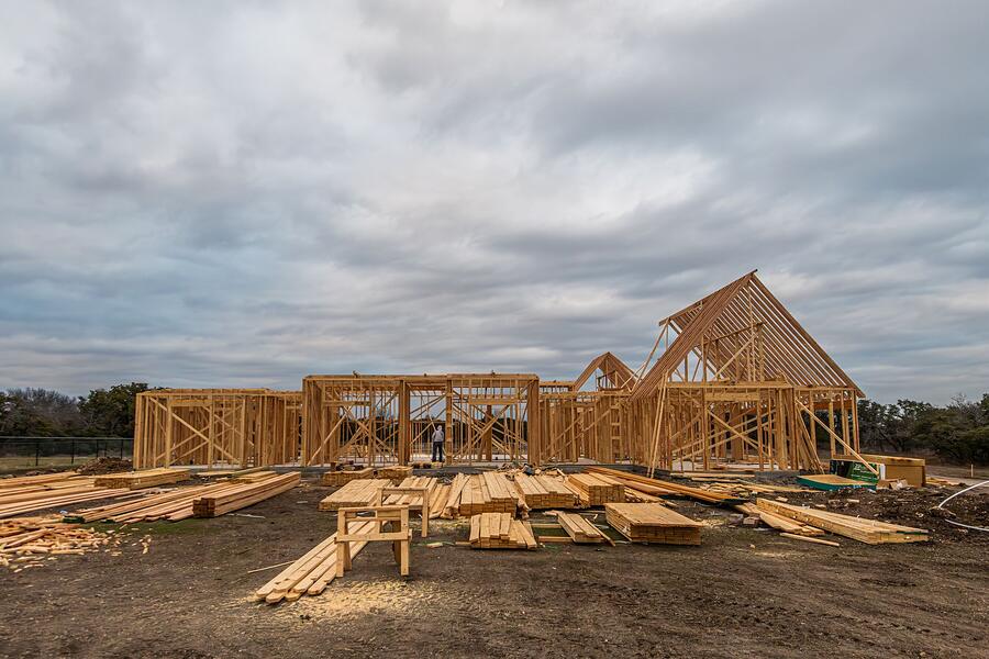 Wooden framing of new houses under construction in Fort Worth